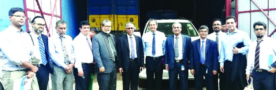 Ahmed Kamal Khan Chowdhury, Managing Director of Prime Bank Limited, poses at a photo session after visit the factory premises of MEP on Wednesday at Barisal financed by the bank. Md. Touhidul Alam Khan, DMD of the bank, Shamsul Alam Chaklader, Chairman,