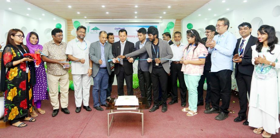 Md. Sabur Khan, Chairman, Board of Trustees, DIU inaugurating 'Green Shade'- a first business initiative based on roof top gardening of the students of Entrepreneurship Department of Daffodil International University through cutting Ribbon and cake the