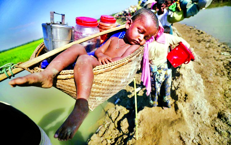 ROHINGYA INFLUX CONTINUES: Hundreds of unarmed civilians, including women, children and elderly people, are entering Bangladesh every day amid aggressive ethnic cleansing operation by the Myanmar army that ravaged most of the Muslim dominated villages in