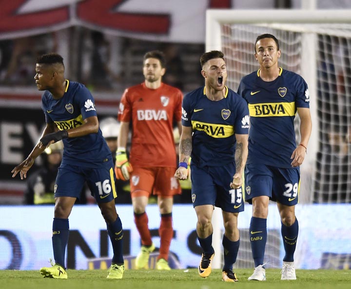 Boca Juniors' Nahitan Nandez (right) celebrates after scoring against River Plate during local tournament soccer match in Buenos Aires, Argentina on Sunday.
