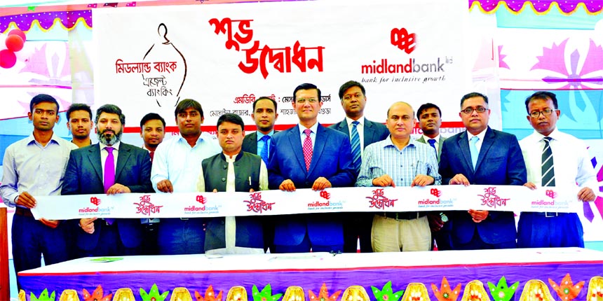 Md. Ahsan-uz Zaman, Managing Director of Midland Bank Limited, inaugurating its agent banking booth at Mostail Bazar of Shahjahanpur in Bogra on Friday. Khorshed Alam, Chief Executive of Bogra Zila Parishad, Md. Ridwanul Haque, Head of Retail Distribution