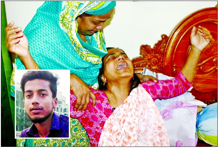 Mother wailing as her son, a BBA student of city's Manarat University Md Nasim (inset) was stabbed to death due to altercation over cricket betting of BPL match on Monday morning.
