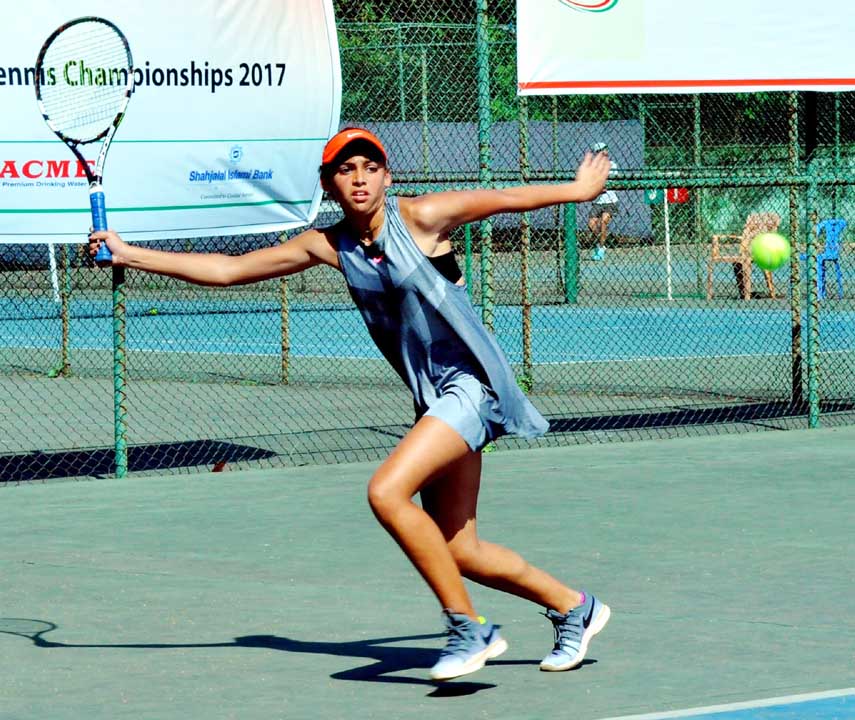 Rahena Lal of Bangladesh in action during her singles match of the International Junior Tennis Championship at National Tennis Complex in the city's Ramna on Tuesday.