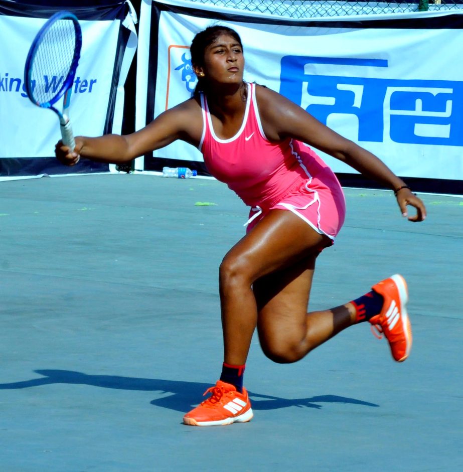Ishita Singh of India in action during her singles match of the International Junior Tennis Championship at National Tennis Complex in the city's Ramna on Wednesday.