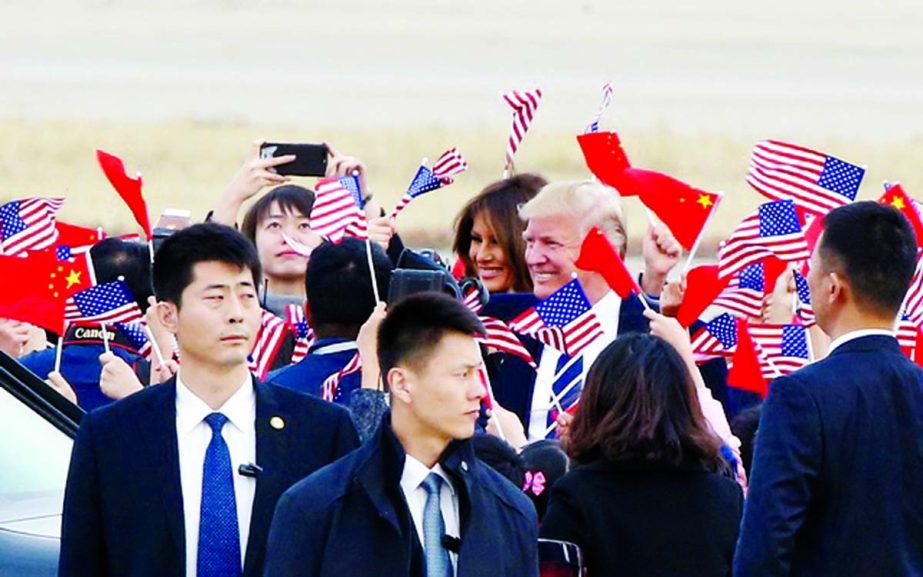 US President Donald Trump and first lady Melania Trump arrive at Beijing airport, China on Wednesday. Internet photo