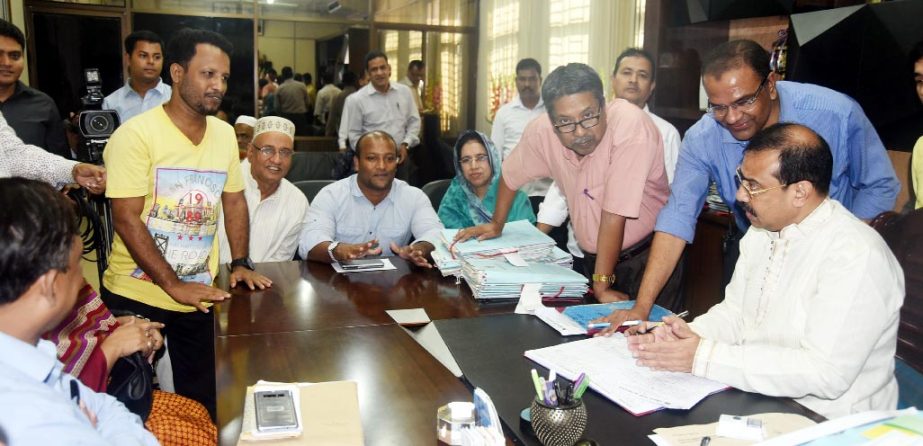 CCC Mayor A J M Nasir Uddin conducting the review appeal on holding tax at Appeal Review Board in Chittagong on Tuesday.