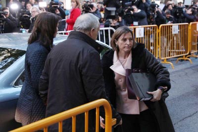 Former Speaker of Catalonia's sacked parliament Carme Forcadell Â® arrives at the Supreme Court in Madrid on Thursday to be questioned over her role in Catalonia's independence drive.