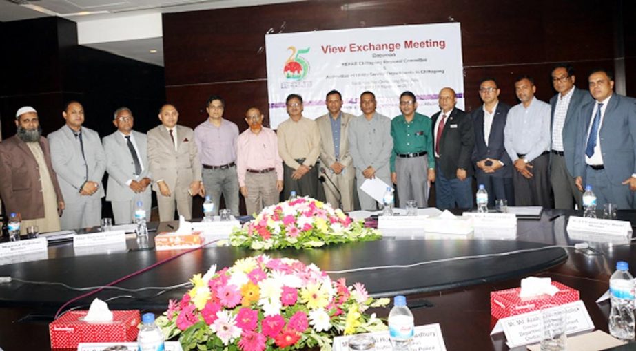 Officials of REHAB Chittagong Region Committee and different organisations of Chittagong Utility Service posed for a photo session at a view exchange meeting arranged by REHAB Chittagong Region recently.