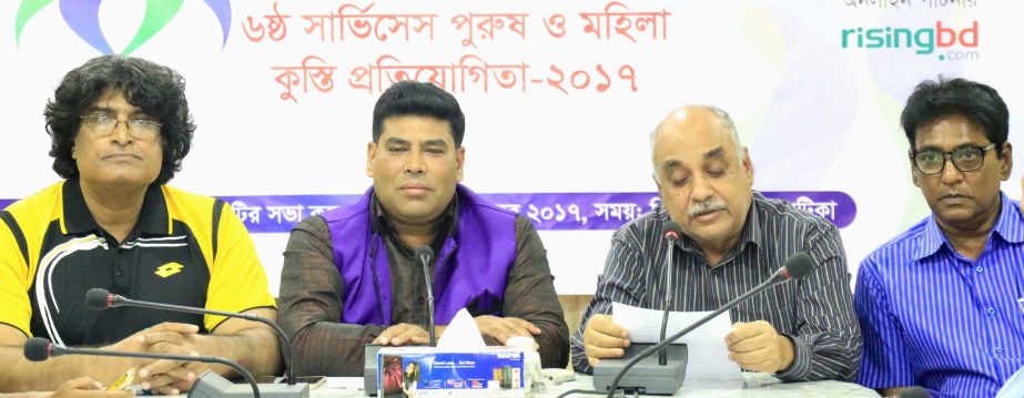 General Secretary of Bangladesh Amateur Wrestling Federation Tabiur Rahman reading the paper of Walton 6th Services (Men's & Women's) Wrestling Competition at the conference room of Dhaka Metropolis Football League Committee in the Bangabandhu National