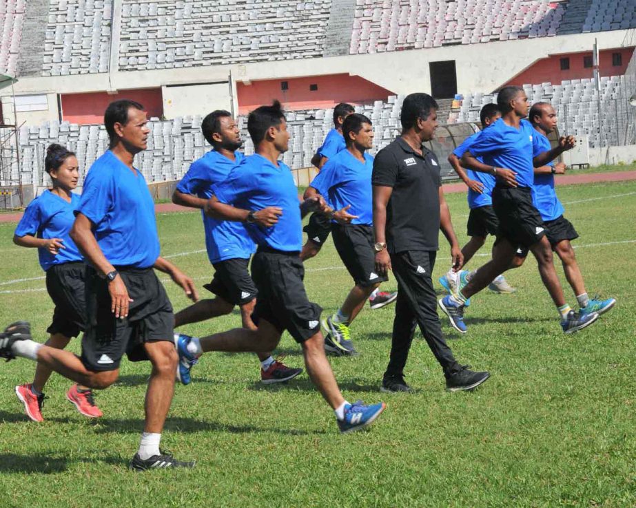 The participants of the FIFA MA Referees' Course during their training session at the Bangabandhu National Stadium on Sunday.