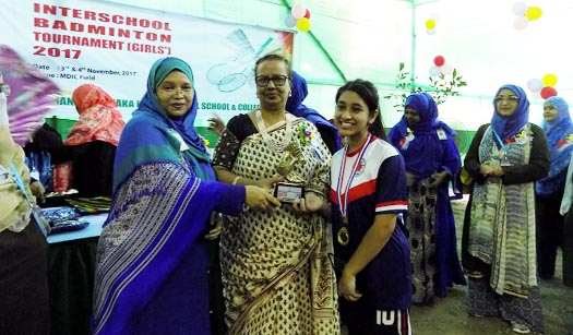 Quamrun Nahar Dana, Director, Muhamedan Sporting Club Ltd and Special Olympic of Bangladesh distributing prizes among the winners of a badminton competition held at Manarat Dhaka International School and College recently.