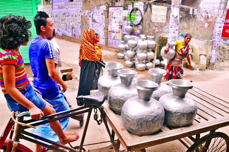 Some people collect drinking water from the WASA pipelines and sell them to different restaurants and messes in the city though there is no way to examine the purity of the water whether it is polluted or not. The photo was taken from Bangla Bazar area on