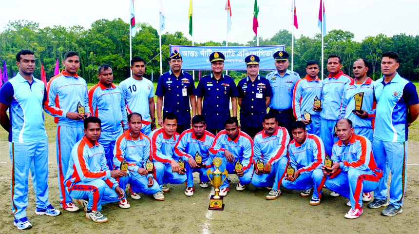 Assistant Chief of Air Staff (Maintenance) Air Vice Marshal M Mazharul Islam poses for photograph with the BAF Base Paharkanchanpur team who won the BAF Kabaddi title at Tangail on Thursday.