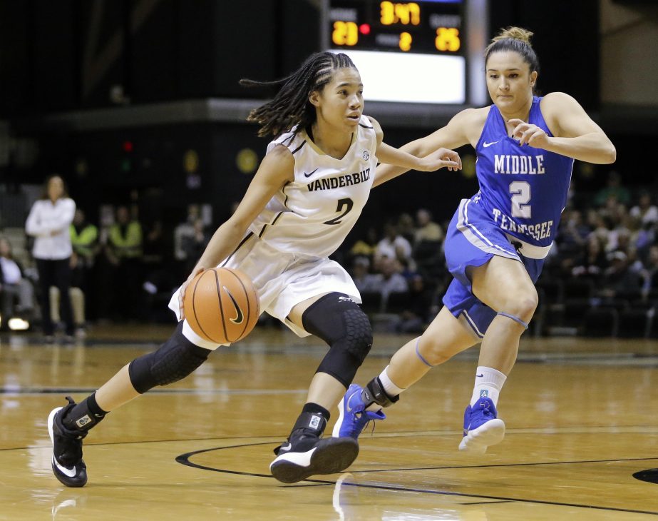 Vanderbilt guard Chelsie Hall (left) drives against Middle Tennessee guard Zeynep Canbaz (right) in the first half of an NCAA college basketball game on Friday.