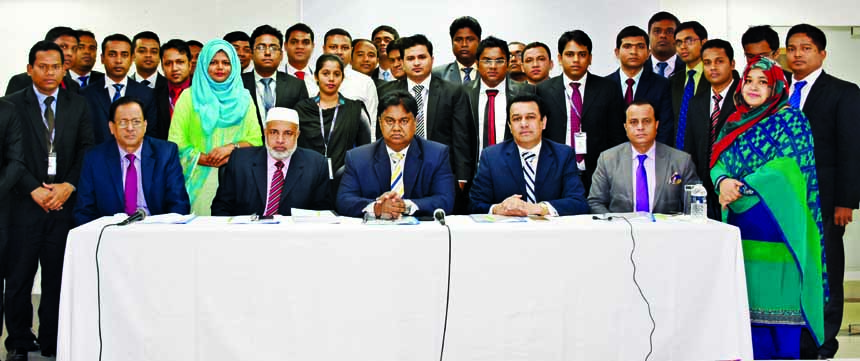 Mosleh Uddin Ahmed, Managing Director of NCC Bank Limited, poses with the participants of the "70th Foundation Training Course" at its Training Institute in the city recently. Md. Habibur Rahman, DMD, Muhammad H Kafi, Head of Operations, J H Shahedi, He