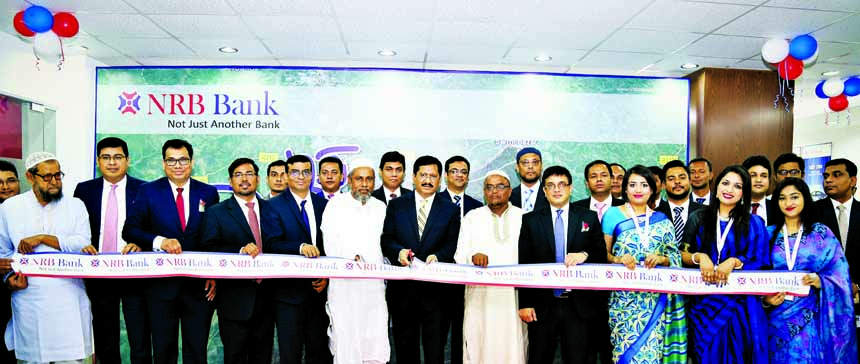 Md. Mehmood Husain, Managing Director of NRB Bank Limited, inaugurating its 31st branch at Sreepur in Gazipur on Sunday. Imran Ahmed, FCA, Chief Operating Officer and Rahat Shams, Head of Retail Banking Division of the bank were also present.