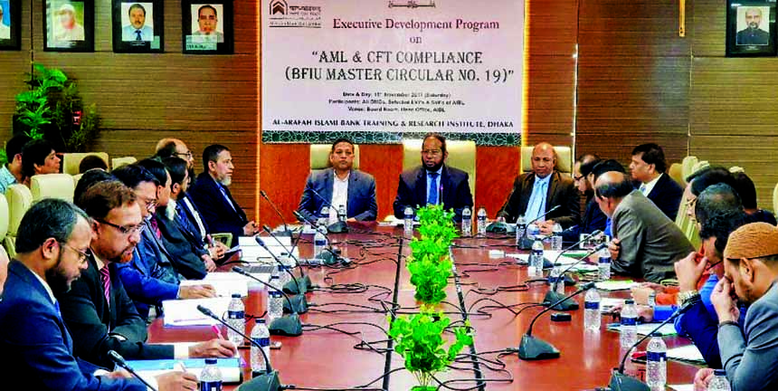 Md. Habibur Rahman, Managing Director of AL-Arafah Islami Bank Limited, presiding over an Executive Development Programme on 'AML and CFT Compliance' at the bank's Training and Research Institute in the city on Saturday.ABM Zahurul Huda, Head of Financ