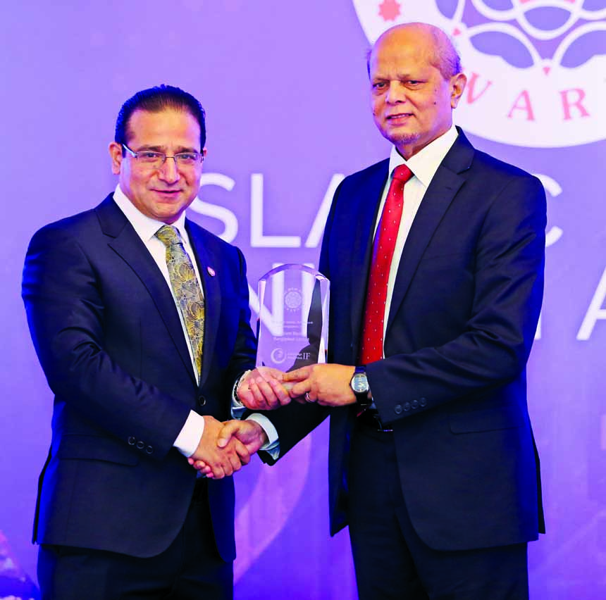 Md. Abdul Hamid Miah, Managing Director of Islami Bank Bangladesh Limited, receiving the 'Islamic Retail Banking Awards (IRBA) 2017' from Professor Humayon Dar, Chairman and Founder of IRBA on Tuesday at JW Marriott Marquis Hotel in Dubai. The bank achi