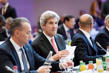 Former Secretary of State John Kerry attends the peace conference in Paris.