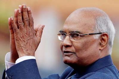 India's new President Ram Nath Kovind gestures after being sworn in at the Rashtrapati Bhavan (presidential palace) in New Delhi.