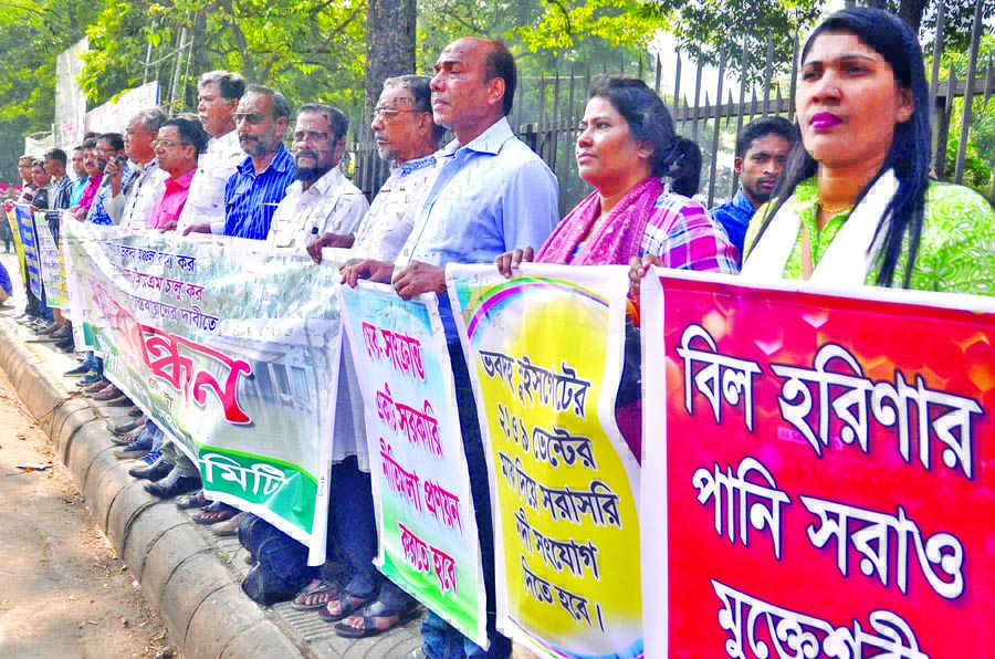 Babdah Pani Niskason Committee formed a human chain in front of Jatiya Press Club on Wednesday demanding steps to remove waterlogging in Babdah Beel and its adjacent areas.