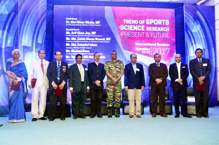 The participants of the seminar on 'Trend of Sports Science Research Present & Future' pose for a photo session at the BKSP in Savar on Wednesday. State Minister for Youth and Sports Dr Biren Sikder was present as the chief guest.