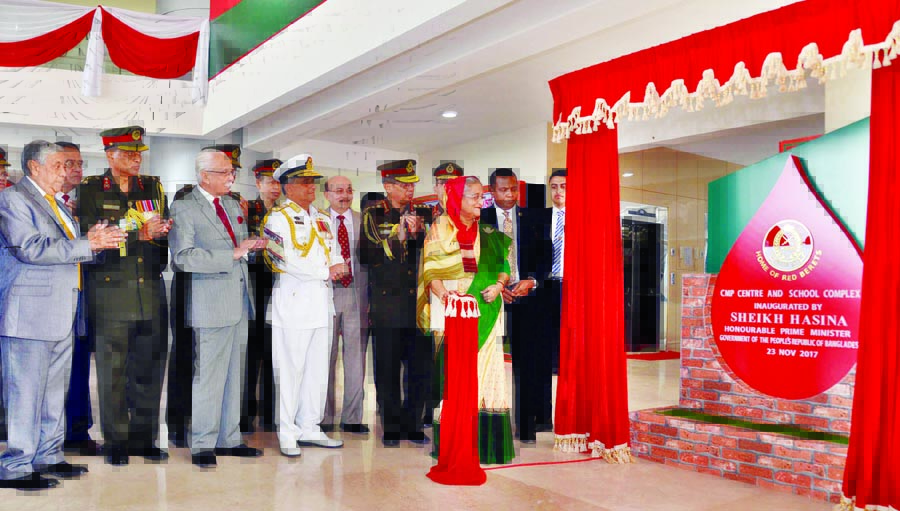 Prime Minister Sheikh Hasina along with other distinguished persons at the inaugural ceremony of CMP Center and School Complex at Savar Cantonment on Thursday. Photo PMO
