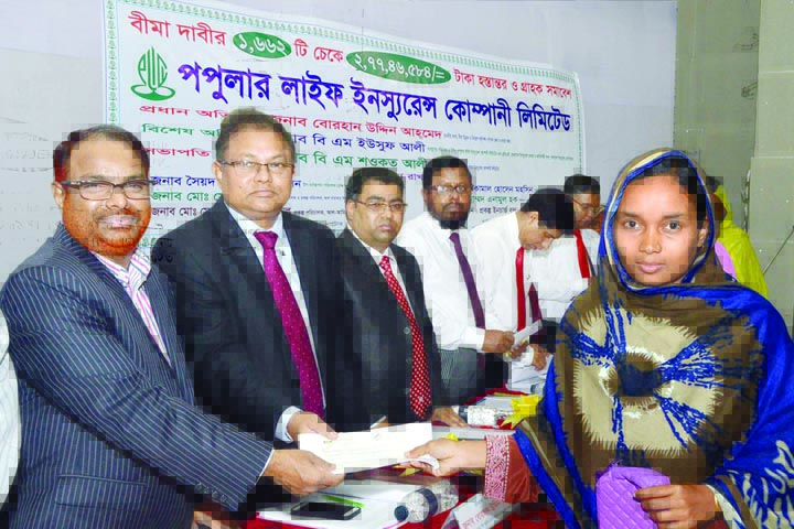 NATORE : Popular Life Insurance Company Ltd distributed Tk 2,77, 46 584 among 1,662 clients as claim money among the clients at a gathering at Natore nawab Sirajuddowla Govt College Auditorium recently. IDRA Member Borhanuddin Ahmed was present as Chi