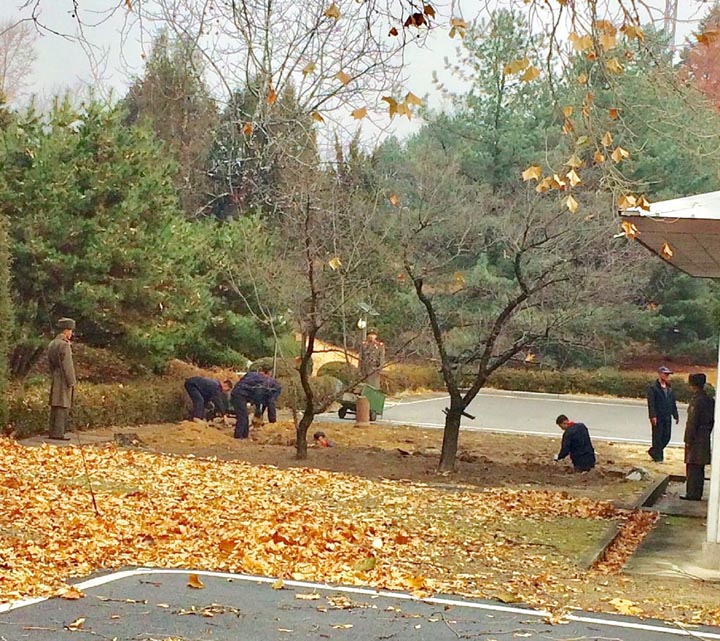 North Korean workers appear to be digging near the spot where a soldier made a dash across the border earlier this month