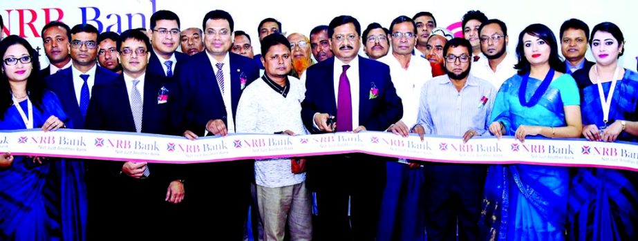 Md. Mehmood Husain, Managing Director of NRB Bank Limited, inaugurating its 32nd branch at Shafipur Bazar in Gazipur on Sunday. Imran Ahmed, FCA, Chief Operating Officer and Rahat Shams, Head of Retail Banking Division of the bank among others were presen