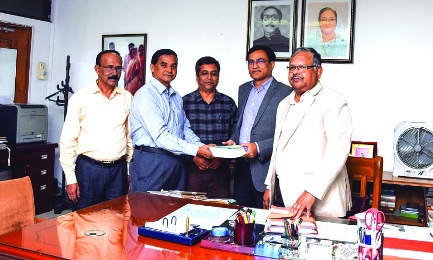 Shyama Prosad Adhikari, Chief Engineer of Local Government Engineering Department (LGED) and Ataur Rahman Bhuiyan, Managing Director of Toma Construction & Company Limited, exchanging an agreement signing documents for Construction of Khulna Coal Based Po