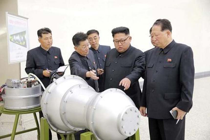 North Korean leader Kim Jong Un provides guidance with Ri Hong Sop (2nd L) and Hong Sung Mu (R) on a nuclear weapons programme in this undated photo released by North Korea's Korean Central News Agency (KCNA) in Pyongyang. AP File photo