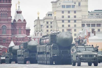 Russian Yars RS-24 intercontinental ballistic missile systems ride through Red Square during the Victory Day military parade in Moscow.