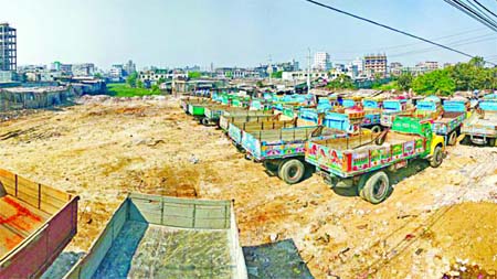 Influential encroachers made a truck zone on the canal after earth filling illegally. But the authorities concerned did not pay any heed to the matter. This photo was taken from city's Basila area on Wednesday.