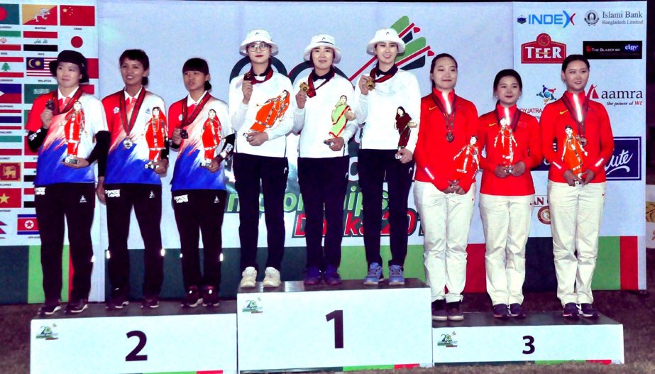 The winners of the Asian Archery Competition pose for photo at the Bangabandhu National Stadium on Thursday.