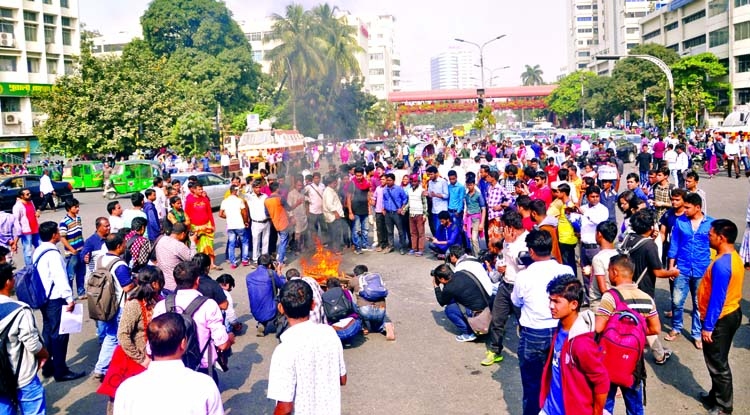 Left parties holding protest marches at various locations in city to support the half-day hartal, protesting govt's decision to raise the price of electricity. This photo was taken from Shahbag intersection on Thursday.