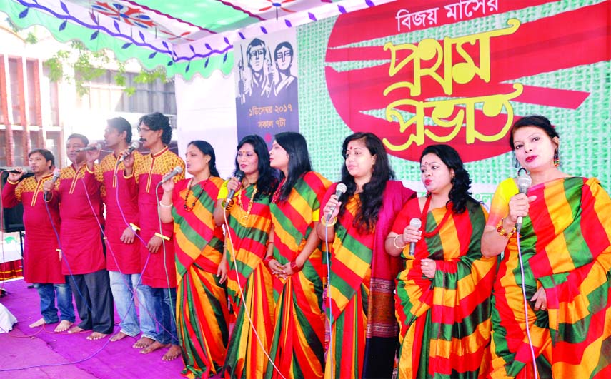 Artistes of Padakshep Bangladesh rendering song on the early hours of Friday on the beginning of the Victory Month. The snap was taken from Hakim Chattar of Dhaka University yesterday.