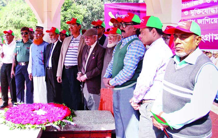 Sector Commander Forum-Muktijuddha '71 placing floral wreaths at Mirpur Martyred Intellectuals Memorial in the city on Friday on the occasion of Freedom Fighters Day.