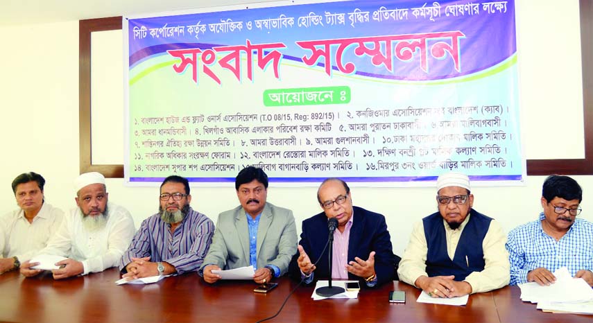 Chairman of Consumers Association of Bangladesh Golam Rahman speaking at a press conference organised by different organisations at the Jatiya Press Club on Sunday in protest against increasing of holding tax by city corporations.