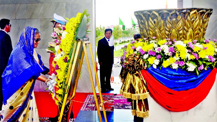 Prime Minister Sheikh Hasina paying homage to Cambodian martyrs by placing wreaths at the Independent Monument on Sunday.