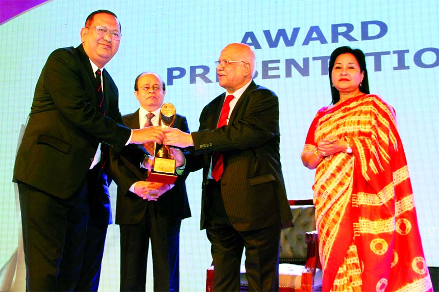 Md. Sohrab Mustafa, DMD of United Commercial Bank Limited, receiving the 'ICAB National Award' for Best Presented Annual Reports 2016 from Finance Minister Abul Maal Abdul Muhith at '17th ICAB National Award Ceremony' programme in the city recently.