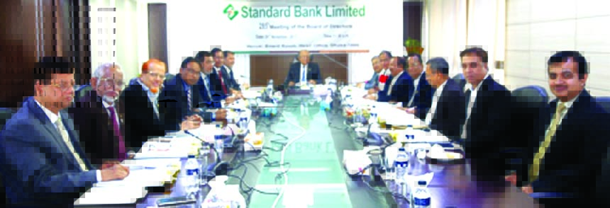 Kazi Akram Uddin Ahmed, Chairman, Board of Directors of Standard Bank Limited, presiding over its 285th Board Meeting at its head office in the city recently. Mamun-Ur-Rashid, Managing Director, SAM Hossain, Vice-Chairman, Kamal Mostafa Chowdhury, Ferozur