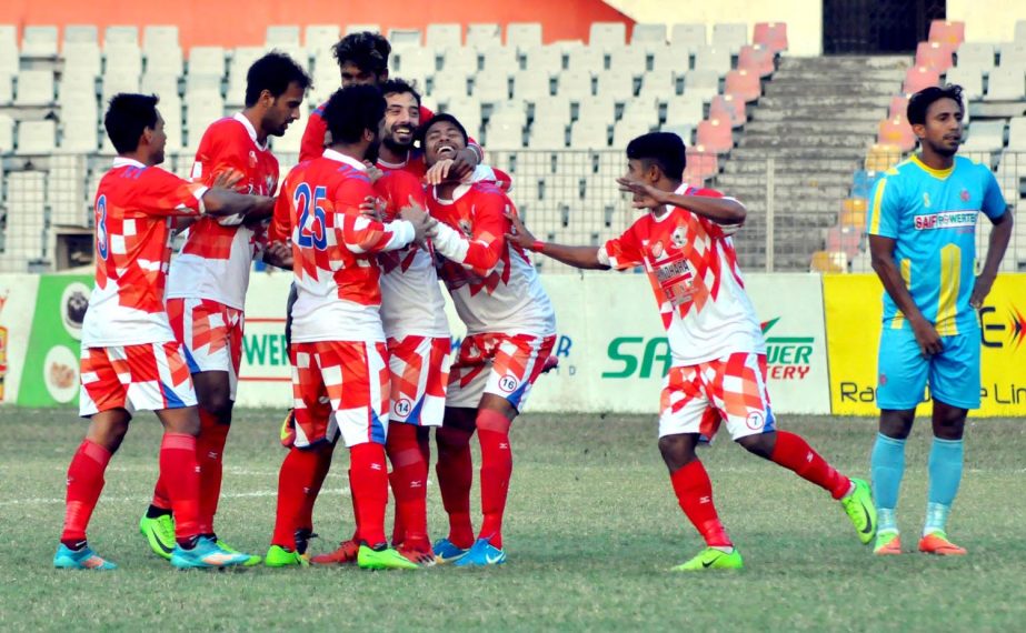 Players of Sheikh Russel Krira Chakra celebrating after scoring a goal against Chittagong Abahani Limited during their match of the Saif Power Battery Bangladesh Premier League Football at the Bangabandhu National Stadium on Tuesday.