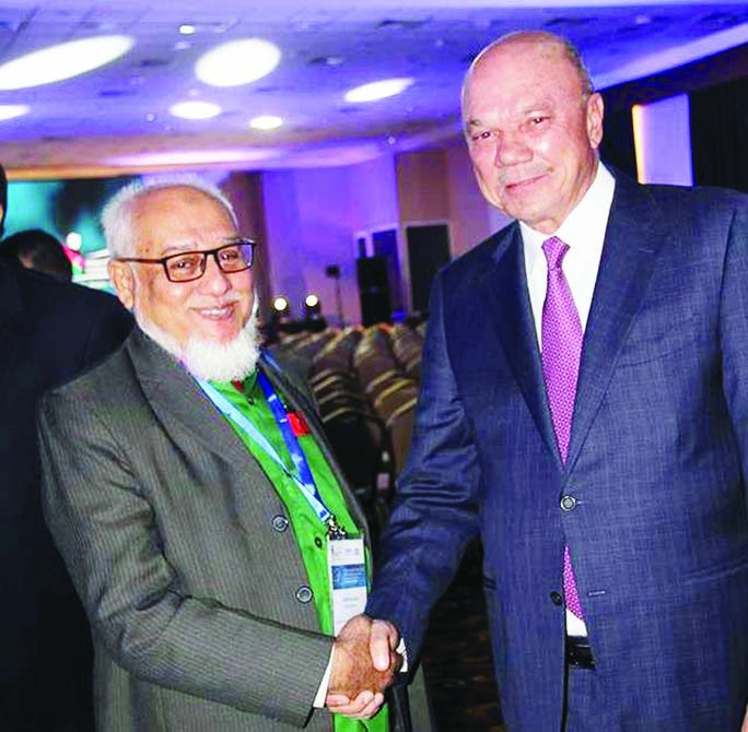 Faisal El-Fayez, President of the Senate, Hashemite Kingdom of Jordan and AHM Nouman, founder and CEO DORP, Bangladesh after the inaugural session at the 15th International Electoral Affairs Symposium held at the King Hussein Bin Talal Convention Cent