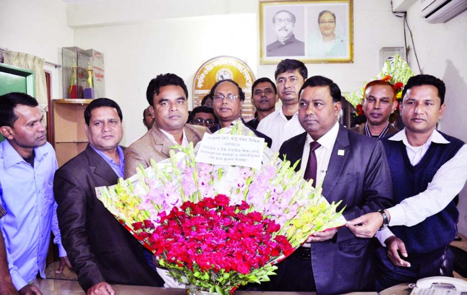 DINAJPUR: New Chairman of Secondary and Higher Secondary Education Board, Dinajpur Prof Md Abu Baker Siddiki being greeted by Md Tofazzur Rahman, Controller and Acting Secretary of the Board at his office on Tuesday.