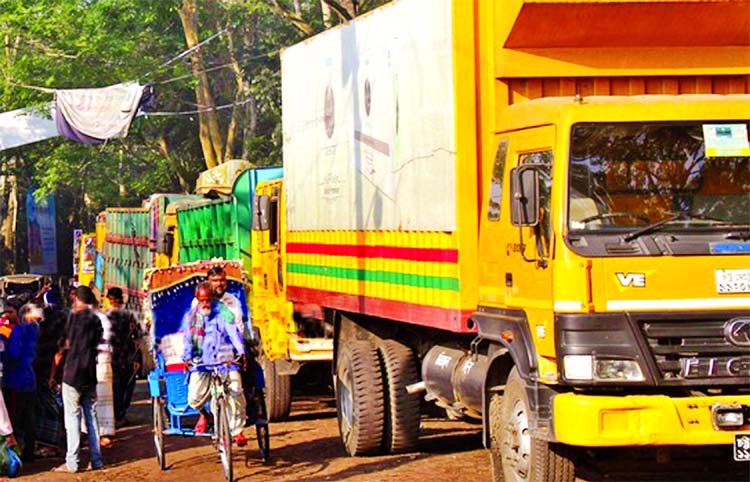 Ferry communications of southern districts with the capital remain suspended early Wednesday as hundreds of heavy to light vehicles got stuck following a collision between a passenger bus and lighterage ship in Kocha River near Bekulia Ferry ghat.