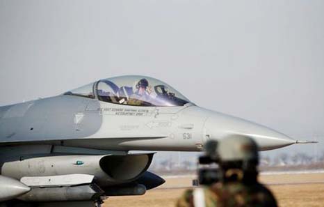 A US Air Force F-16 fighter jet takes part in a joint aerial drill exercise called 'Vigilant Ace' between U.S. and South Korea, at the Osan Air Base in Pyeongtaek, South Korea on Wednesday.