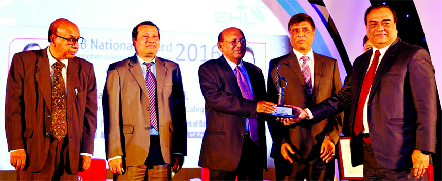 Dhiraj Malakar, Managing Director of Eastern Housing Limited, receiving the 4th ICSB National Award for Corporate Governance Excellence- 2016 in IT, telecom and Services category from Commerce Minister Tofail Ahmed, organized by ICSB in the city recently.