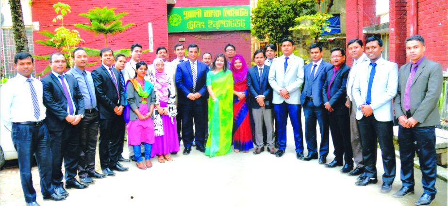 Md. Abdul Halim Chowdhury, Managing Director of Pubali Bank Limited, poses with participants of the closing ceremony of a training course on 'Foundation Training for Senior Officers and Officers' at its Training Institute in the city recently. Niranjan