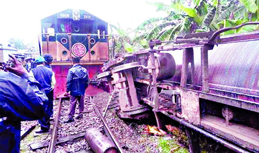 At least four bogies of oil laden goods train coming from Chittagong derailed and turned turtle on Mymensingh-Jamalpur route resulting train communication was snapped for several hours. This photo was taken from near Bidyaganj Railway Station on Saturday.